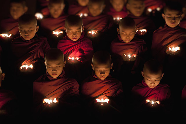 Travel Photography Image © Scott Stulberg - Monks praying in Yangon, Burma